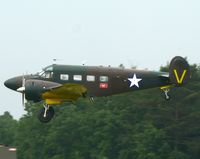 F-AZEJ @ LFFQ - Beechcraft E18S F-AZEJ painted as USAAC 22429/V - by Alex Smit