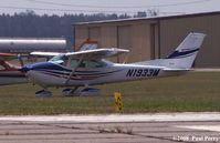 N1933M @ SFQ - Taking a rest on the grass ramp