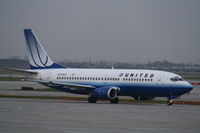 N339UA @ KORD - Boeing 737-300 - by Mark Pasqualino
