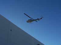 N204AH - Placing A/C units on a roof - by Evans St. Romain, Jr.