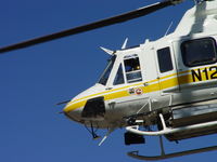 N120LA @ POC - Flight Crew hard at work - by Helicopterfriend