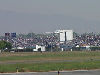 N47451 @ POC - Inbound Brackett passing Drag Racing fans - by Helicopterfriend