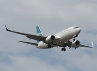 C-GWBN @ TPA - West Jet 737-700 - by Florida Metal