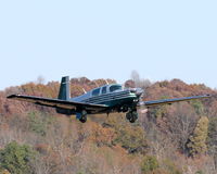 N10933 @ 5W8 - Departing runway 22 - by John W. Thomas
