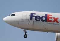 N654FE @ KLAX - On final to LAX, taken from the Proud Bird.  This Fedex bird is RICHARD - by phantomphan1974
