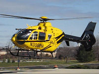 N309PH @ KIND - Photo at Conseco landing pad Carmel, Indiana - by Dr. Ronald A. Weiss