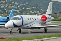 OE-GEH @ LFMD - Bizzjet at rest while a natural bird (black and white) flies underneath. - by Philippe Bleus