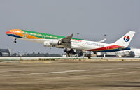 B-6055 @ KLAX - Very special scheme lifting off from rwy 25R - by Philippe Bleus