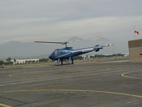 N305RB @ POC - Moving to taxiway for westerly take off - by Helicopterfriend