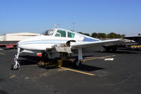 N1898H @ GKY - At Arlington Municipal - This Cessna 310 has been sitting on the ramp for at least 10 years. The owner passed away several years ago and the airplane became a bird nest. It was taken to the graveyard last week. It's always hard to see an airplane die.