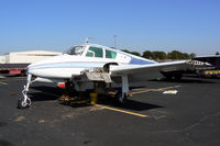 N1898H @ GKY - At Arlington Municipal - This Cessna 310 has been sitting on the ramp for at least 10 years. The owner passed away several years ago and the airplane became a bird nest. It was taken to the graveyard last week. It's always hard to see an airplane die. - by Zane Adams