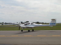 N283DC @ KFCM - Taxiing to Runway 18. - by Mitch Sando