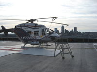 N117MH @ KIND - Life Line with Indianapolis Skyline - by Dr. Ronald A. Weiss