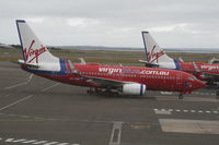 VH-VBN @ YSSY - leaving the gate - by Daniel Vanderauwera