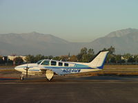 N584MW @ POC - Being towed back after having it's bath at Brackett - by Helicopterfriend