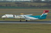 LX-LGC @ LOWW - LUXAIR  DASH8-402 - by Delta Kilo