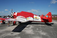 N991GM @ SUA - Aeroshell T-6