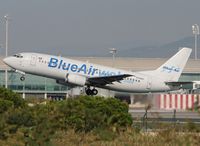 YR-BAC @ LEBL - Taking off RWY 25L. - by Jorge Molina