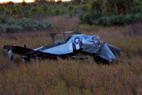 N757SM @ VRB - The wreckage of a single engine F1 Rocket EVO lays in a marshy area of the St.Sebastian River Preserve after the pilot and only occupant made an emergency landing after loosing power of his aircraft at an altitude of around 1000 ft Sunday afternoon. The p - by Scott Boileau