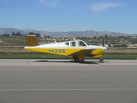 N4290B @ CMA - 1955 Beech F35 BONANZA, Continental E-225-8 225 Hp, taxi - by Doug Robertson