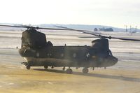 86-01653 @ CID - Taxiing past the tower to Landmark FBO. Blowing dust, blowing snow and glare on my window.