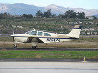 N2347A @ CMA - 1969 Beech E33 BONANZA, Continental IO-470 225 Hp, First Debonair series to be called a Bonanza, taxi to Rwy 26 - by Doug Robertson