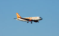 G-EZIP @ STN - G-EZIP landing at Stansted - by Mark Ridgwell