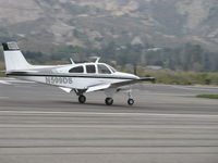 N599DS @ SZP - 1967 Beech E33A BONANZA, Continental IO-520-B 285 Hp, landing roll Rwy 22 - by Doug Robertson