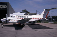 VQ-TIU @ YSSY - YSSY (Sold to Turks & Caicos as VQ-TIU but seen here as VH-AMB with the RFDS and subsequently W/O on 6 Feb 2007 off Major Hill North Caicos) - by Nick Dean