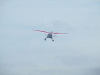N21117 - Departing its Home Field. - by Terry L. Swann