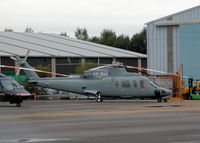 VP-BNI @ EGLK - LOOKING A BIT DRAB IN GREY ONE OF FIVE S.76 IN THE PREMIAR COMPOUND OF THREE VARIANTS SEEN THIS DAY - by BIKE PILOT
