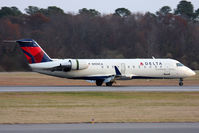 N959CA @ ORF - Delta Connection (Comair) N959CA (FLT COM1336) rolling out on RWY 23 after arrival from Cincinatti Northern Kentucky Int'l (KCVG).