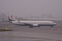 OE-ILX @ EDDH - Lining up in the snow at Hamburg