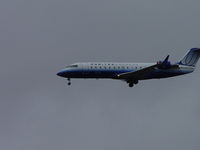 N905SW @ ONT - Almost over the fence and landing in the rain at Ontario - by Helicopterfriend