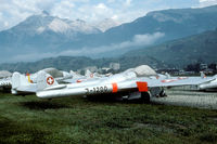 J-1200 @ LSMS - After withdrawl the Vampires were stored at Sion. In this picture about 10 different airframes can be seen. J-1200 is now preserved in Luzern.