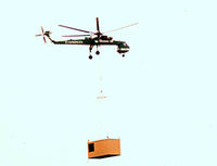N6979R @ GKY - Evergreen heavy lift helicopter placing HVAC units on the Arlington, TX General Motors plant - by Zane Adams