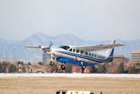 N423GS @ KAPA - Landing on 17L on a very windy day.