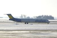 N403NV @ CID - Taxiing to Runway 9.  I'm looking into the snow, haze and sun! - by Glenn E. Chatfield