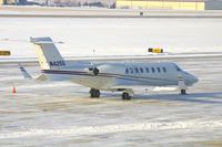 N425G @ CID - GEICO's bird, parked on the Landmark Ramp, as seen from my office in the tower. - by Glenn E. Chatfield