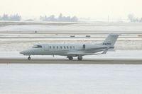 N425G @ CID - GEICO departing runway 13, as seen from my office in the tower. - by Glenn E. Chatfield
