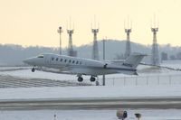 N425G @ CID - Departing runway 13.  Background are the tower's communications antennae - by Glenn E. Chatfield