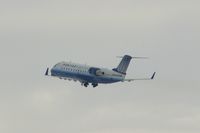 N592ML @ CID - Landing gear coming up.  On the way to O'Hare International - by Glenn E. Chatfield