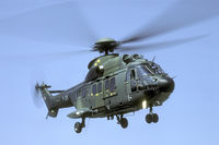 T-311 @ OFF AIRPOR - This Super Puma transported us into the field somewhere south of Zürich. Here the Swiss had constructed a make shift bombing range.