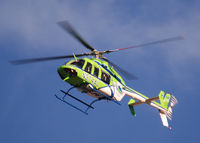 N374AL - AirLife Denver heading West over Columbine High School Littleton, Colorado. - by Bluedharma