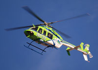 N374AL - AirLife Denver heading West over Columbine High School Littleton, Colorado. - by Bluedharma