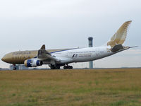 A9C-KC @ LFPG - Taken at 6 am local, under rain... sorry for bad quality. - by Guillaume BESNARD