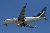 C-GYWJ @ TPA - West Jet 737-700 - by Florida Metal