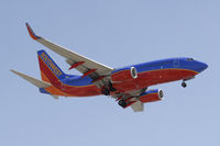 N276WN @ KLAX - Southwest 737 landing at LAX - by Todd Royer