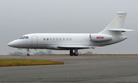 N85M @ EGGW - Uninspiring colour scheme for this Falcon 2000EX - by Terry Fletcher