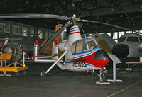 N6169S @ KWWD - A rare 1965-vintage autogyro takes up residence at the Naval Air Museum. - by Daniel L. Berek
